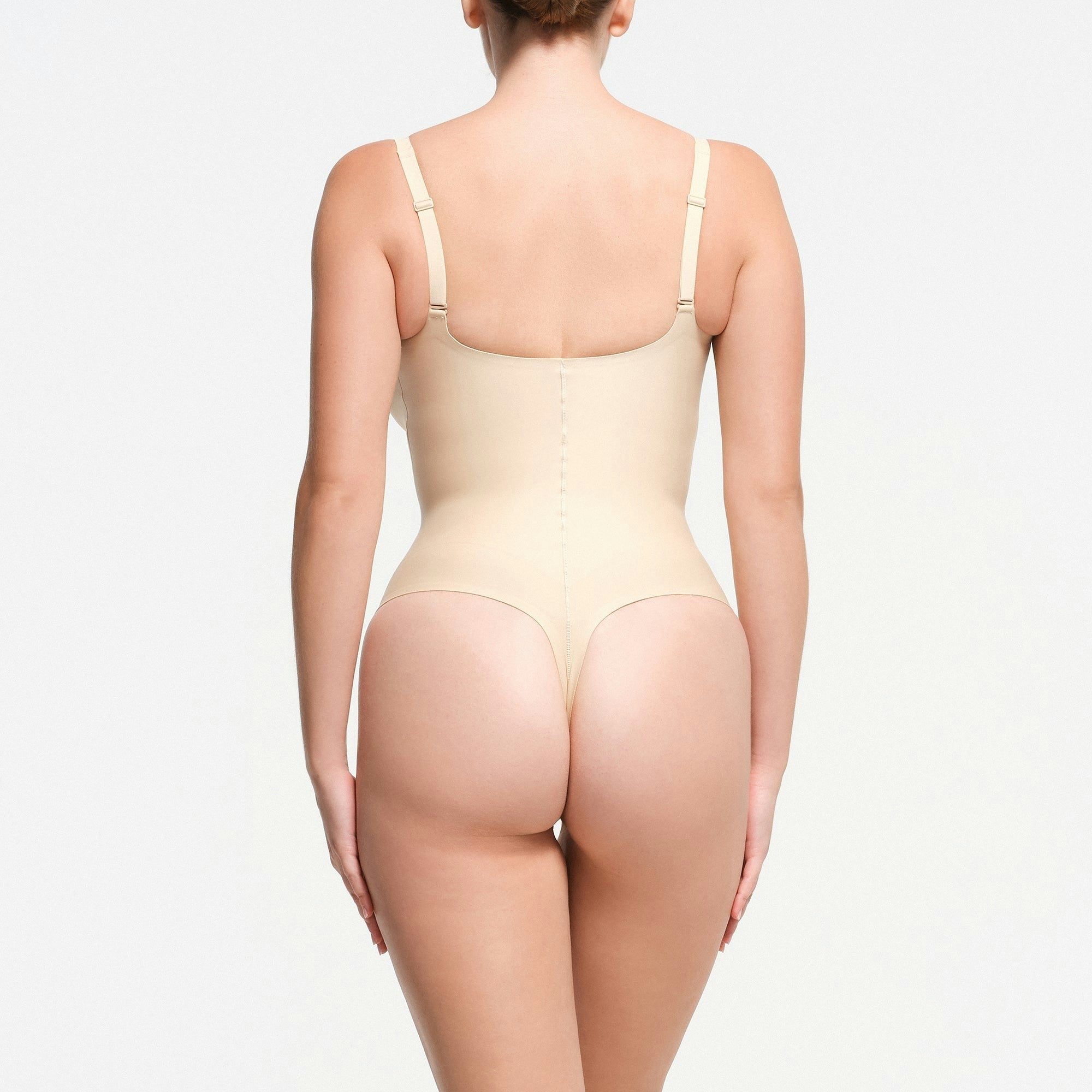 CORE SCULPT PLUNGE THONG BODYSUIT