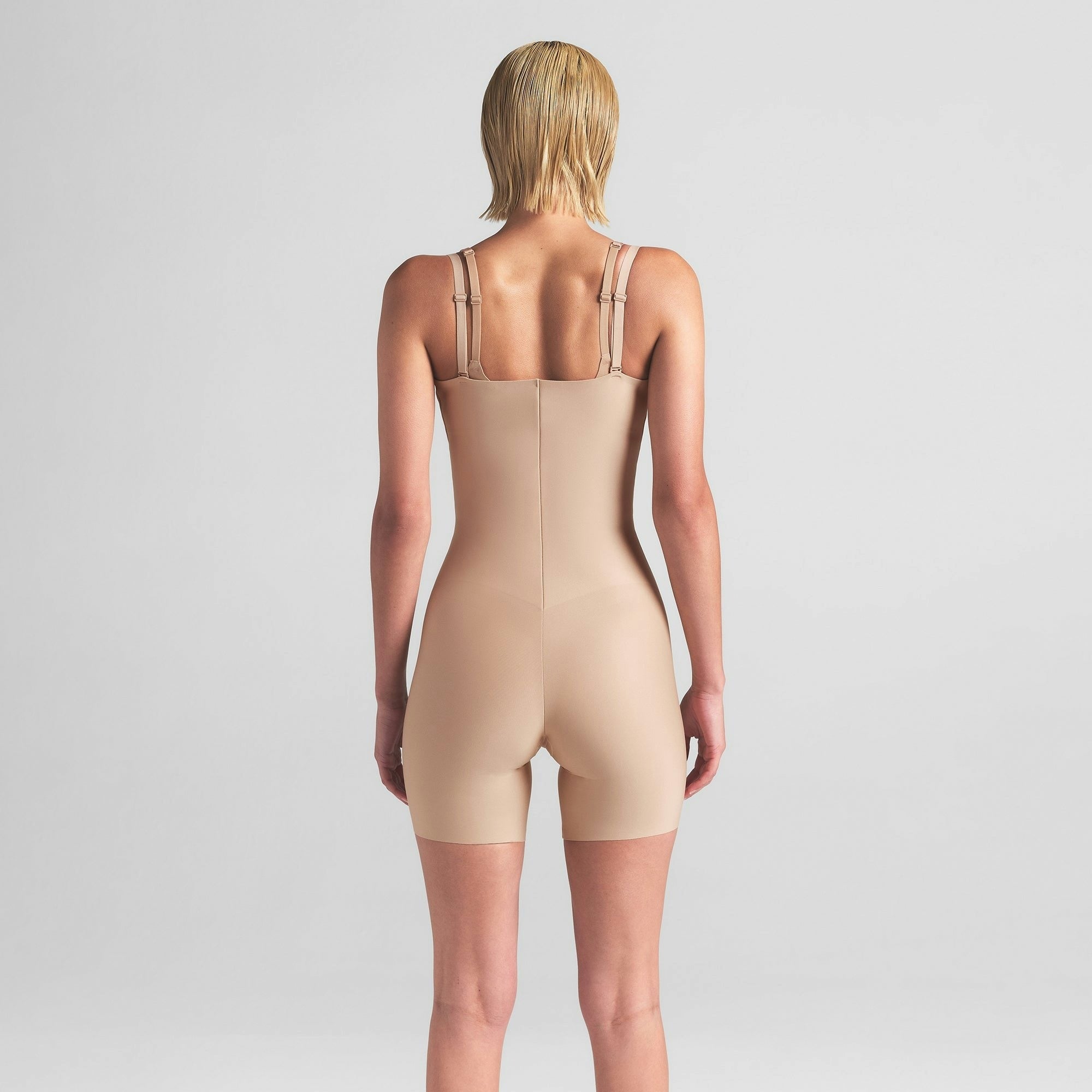 CORE SCULPT OPEN BUST MID THIGH BODYSUIT