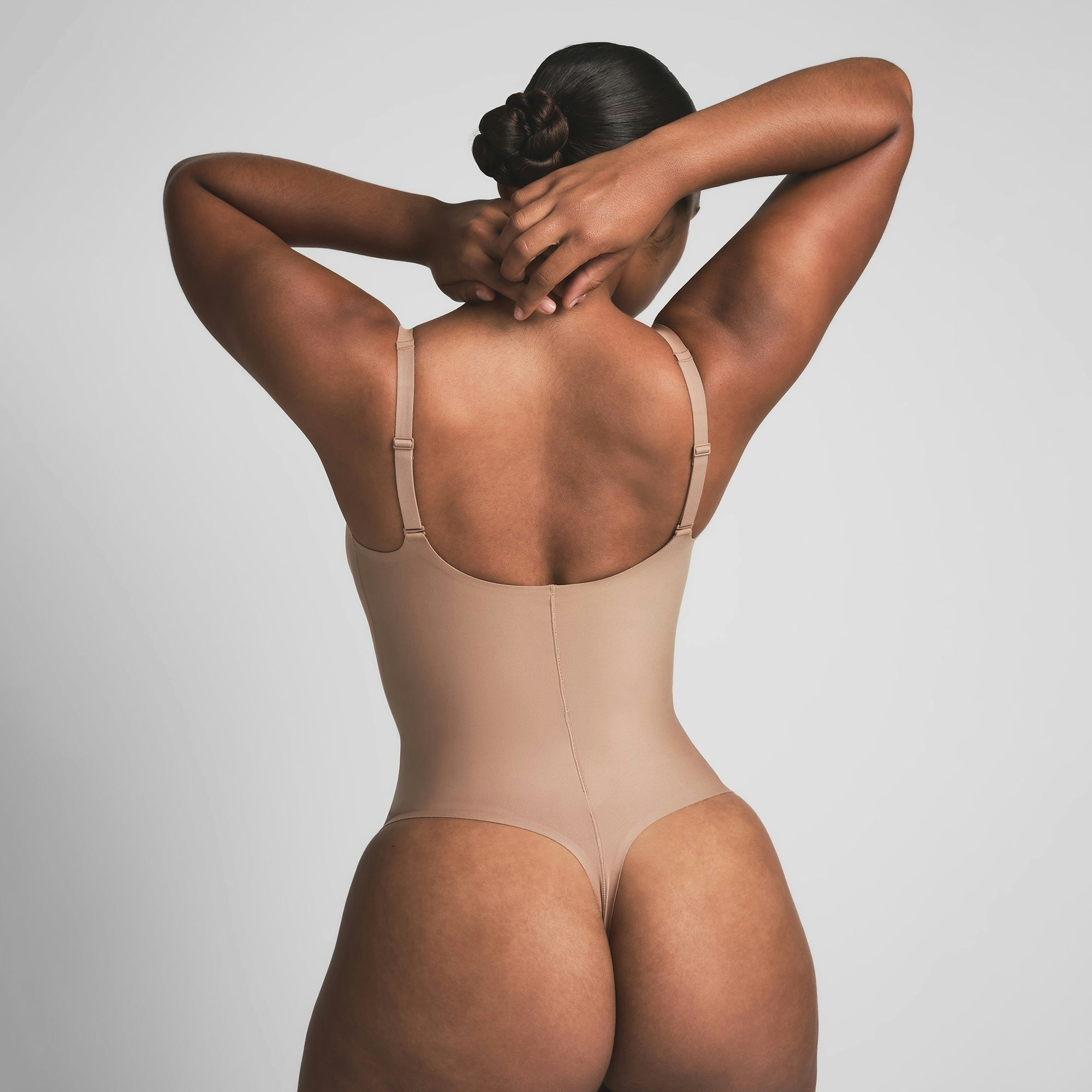 CORE SCULPT PLUNGE THONG BODYSUIT