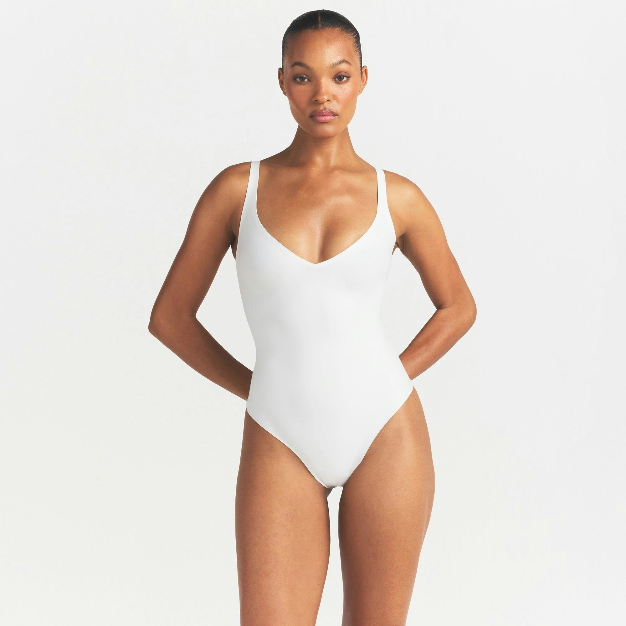 UNLINED PLUNGE THONG BODYSUIT