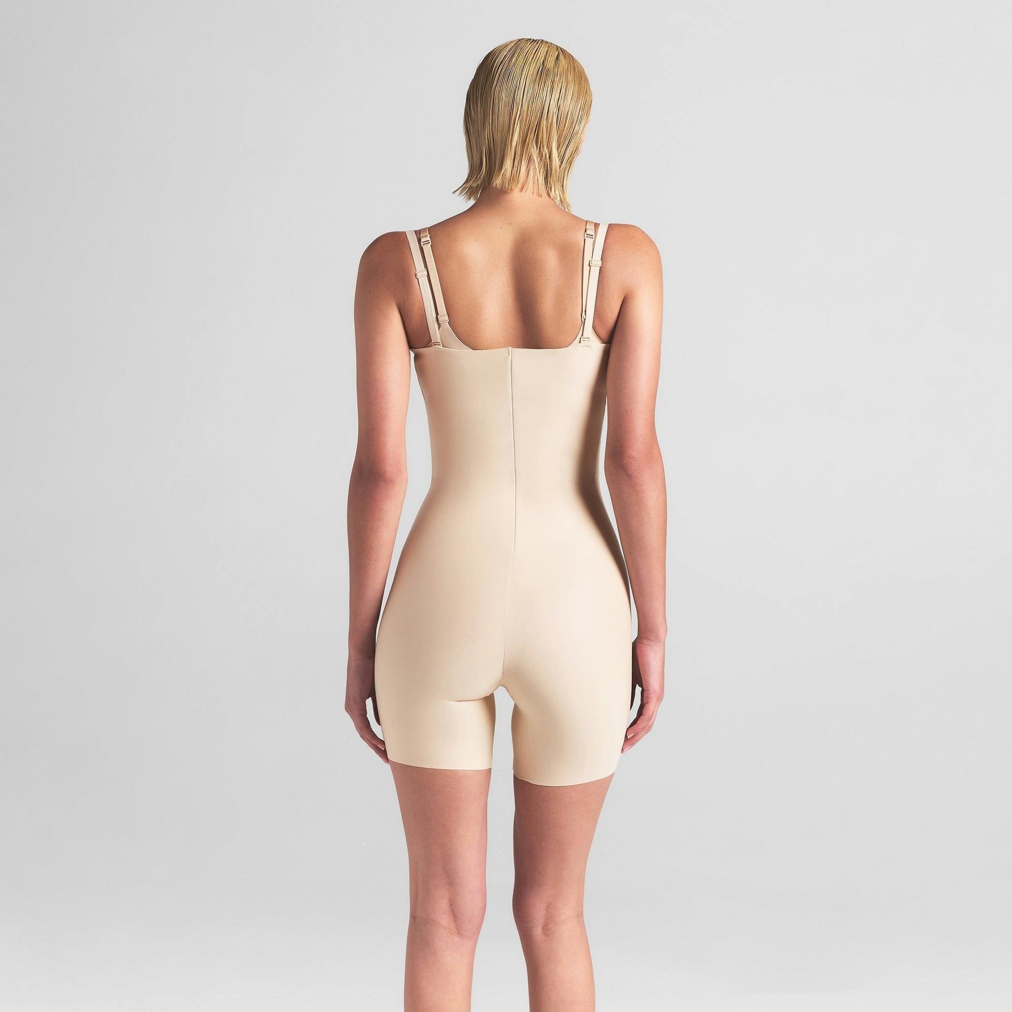 CORE SCULPT OPEN BUST MID THIGH BODYSUIT
